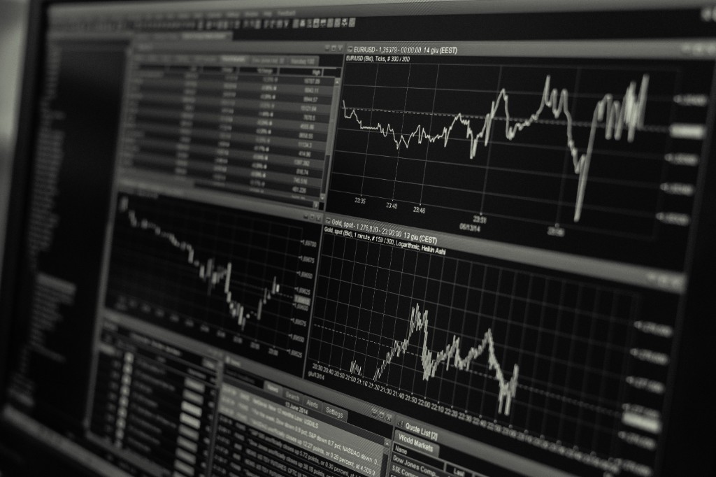 Financial trading dashboard with charts, quote lists, and market data